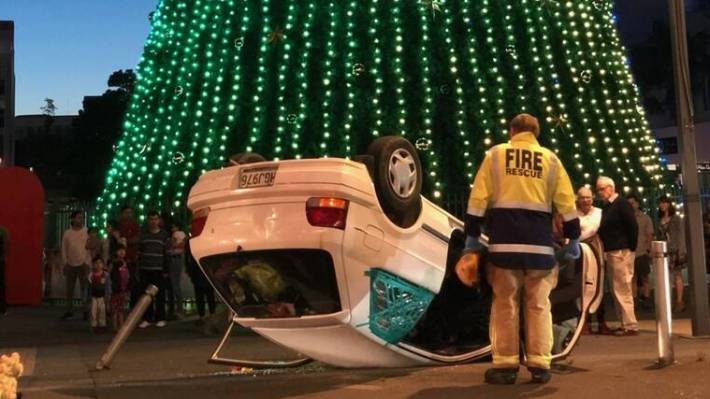 No-one was hurt when the car landed beside the Christmas tree in Garden Place.