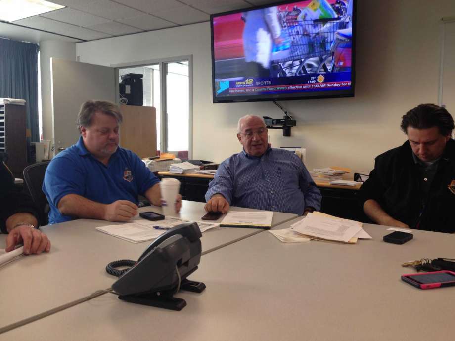 Stamford Director of Operations Ernie Orgera (center) updates city staff on preparations for the upcoming snow storm. Photo: Keila Torres Ocasio / Hearst Connecticut Media / Stamford Advocate