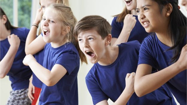 children enjoying drama class