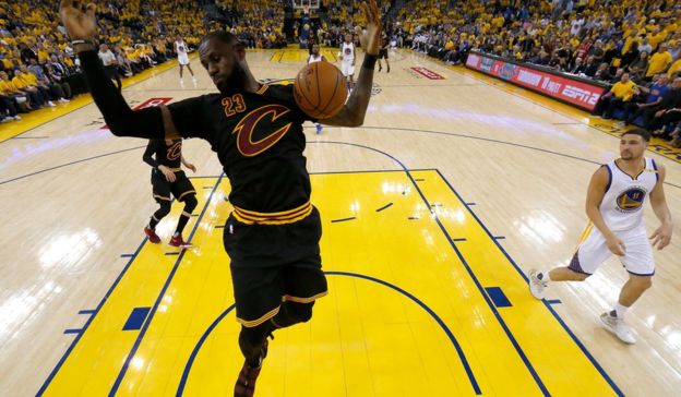 LeBron James, of the Cleveland Cavaliers, dunks the ball against the Golden State Warriors, June 2017